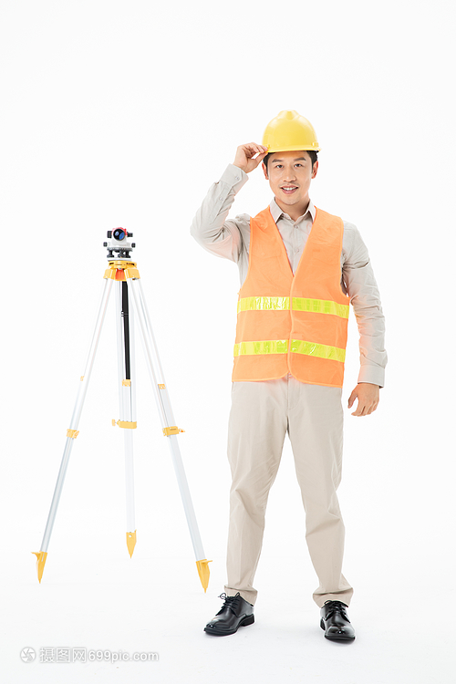 精准的基石 工人手中的测绘水平仪与工程测量